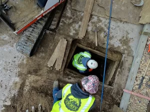 Minneapolis sewer repair crew performing residential sewer service